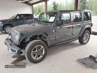 2019 Jeep Wrangler Unlimited Sahara with VIN 1C4HJXEN0KW540591, listed as a IAAI auction lot 42076235 with 41,016 mi miles and . Bid and sale history available at DreamBid. Image 18.