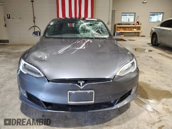 2017 Tesla Model S 100D with VIN 5YJSA1E29HF210731, listed as a Copart auction lot 56762565 with 114,117 mi miles and Salvage title. Bid and sale history available at DreamBid. Image 5.