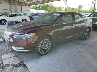 2017 Ford Fusion Hybrid Titanium with VIN 3FA6P0RU7HR363439, listed as a Copart auction lot 56222115 with 127,873 mi miles and Salvage title. Bid and sale history available at DreamBid. Image 1.