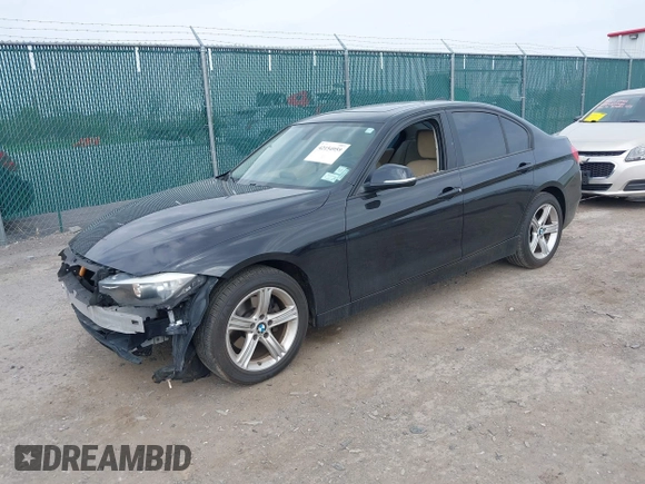 2013 BMW 3 Series 328i with VIN WBA3A5G54DNP22487, listed as a IAAI auction lot 42154959 with 117,380 mi miles and . Bid and sale history available at DreamBid. Image 2.
