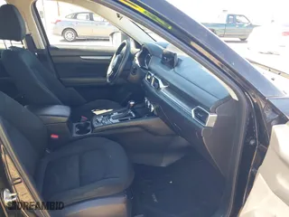 2017 Mazda CX-5 Sport with VIN JM3KFBBL2H0144792, listed as a IAAI auction lot 41654031 with 77,107 mi miles. Bid and sale history available at carsss.com. Image 5.