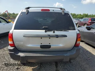 2004 Jeep Grand Cherokee Laredo with VIN 1J4GW48S44C282992, listed as a Copart auction lot 61523685 with 112,486 mi miles and Clean title. Bid and sale history available at DreamBid. Image 6.