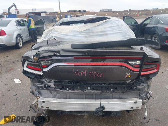 2020 Dodge Charger Scat Pack z VIN 2C3CDXGJXLH107344, wystawiony jako IAAI lot #41888453 z przebiegiem Nie podano mil oraz . Historia ofert i sprzedaży dostępna na DreamBid. Obrazek 6.