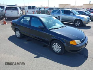 1999 Mazda Protege DX z VIN JM1BJ2228X0108327, wystawiony jako IAAI lot #41630708 z przebiegiem 171 459 mil mil oraz . Historia ofert i sprzedaży dostępna na DreamBid. Obrazek 1.