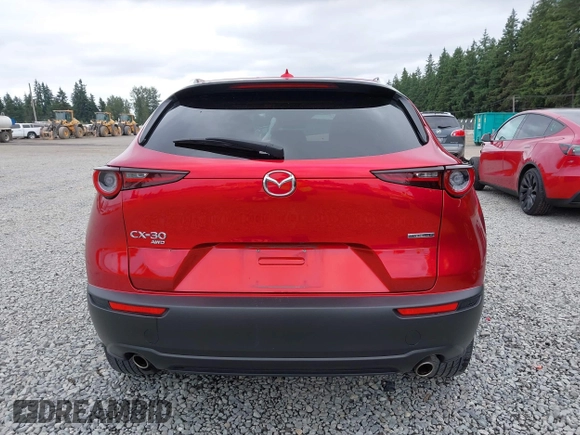 2021 Mazda CX-30 Premium with VIN 3MVDMBDM7MM213754, listed as a IAAI auction lot 42509691 with 61,230 mi miles and . Bid and sale history available at DreamBid. Image 17.
