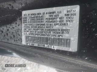 2012 Honda Odyssey EX-L with VIN 5FNRL5H6XCB057557, listed as a IAAI auction lot 42022410 with 174,286 mi miles and . Bid and sale history available at DreamBid. Image 9.