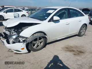 2014 Chevrolet Cruze 1LT with VIN 1G1PC5SB6E7161106, listed as a IAAI auction lot 41655726 with 118,161 mi miles and . Bid and sale history available at DreamBid. Image 2.