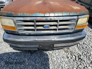 1995 Ford Bronco Custom с VIN 1FMEU15HXSLB23896, выставлен на аукционе Copart как лот 57969185 с пробегом Не указан миль и Чистый • Clean title. История ставок и продаж доступна на DreamBid. Изображение 12.