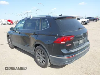 2024 Volkswagen Tiguan SE with VIN 3VVNB7AXXRM031028, listed as a IAAI auction lot 41832841 with 16,170 mi miles and . Bid and sale history available at DreamBid. Image 3.