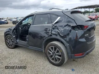 2018 Mazda CX-5 Grand Touring with VIN JM3KFADM3J1370114, listed as a Copart auction lot 54579585 with 65,513 mi miles and Salvage Title. Bid and sale history available at DreamBid. Image 2.