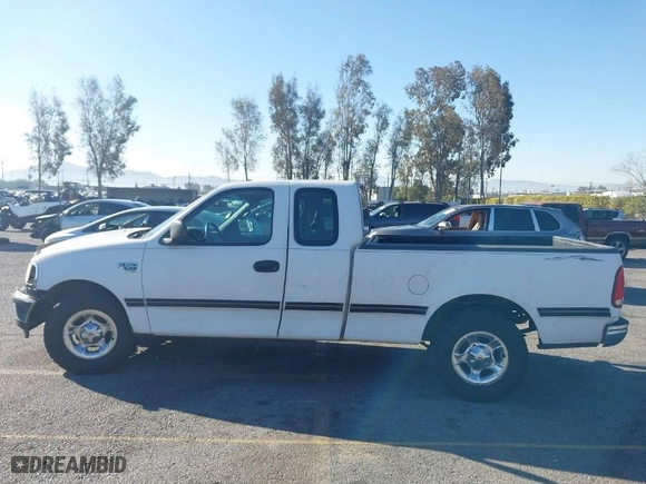 1998 Ford F-150 Standard with VIN 1FTZX1762WNA88290, listed as a IAAI auction lot 41648021 with 250,013 mi miles. Bid and sale history available at carsss.com. Image 14.