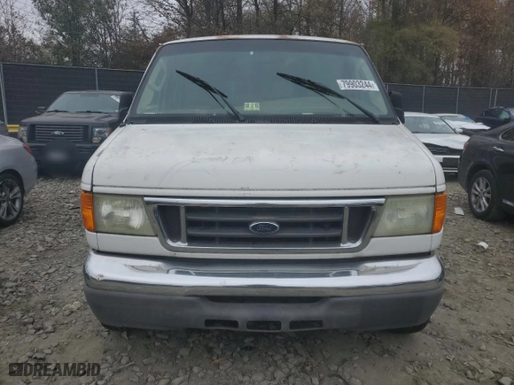 2006 Ford Econoline Wagon XL with VIN 1FBNE31L36HA02924, listed as a Copart auction lot 79903244 with 217,831 mi miles and Salvage Title. Bid and sale history available at carsss.com. Image 5.