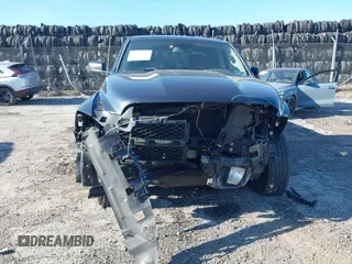 2014 Ram 1500 Express z VIN 1C6RR7FT5ES418905, wystawiony jako IAAI lot #41758174 z przebiegiem 92 443 mil mil oraz . Historia ofert i sprzedaży dostępna na DreamBid. Obrazek 6.