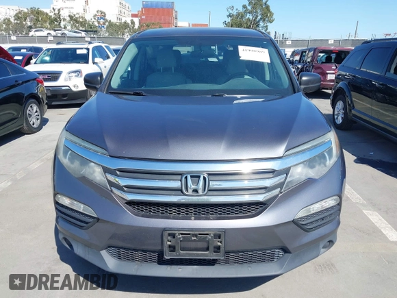 2016 Honda Pilot LX with VIN 5FNYF5H1XGB032851, listed as a IAAI auction lot 41998989 with 68,882 mi miles and . Bid and sale history available at DreamBid. Image 12.
