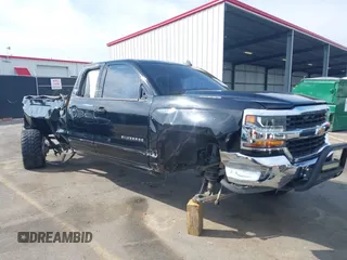 2016 Chevrolet Silverado 1500 LT with VIN 1GCRCREC1GZ374418, listed as a IAAI auction lot 41767741 with 123,632 mi miles and . Bid and sale history available at DreamBid. Image 1.