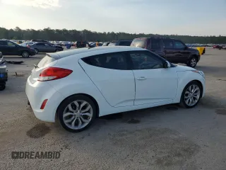 2013 Hyundai Veloster w/Gray Int with VIN KMHTC6ADXDU130886, listed as a Copart auction lot 57478095 with 130,008 mi miles and Salvage title. Bid and sale history available at DreamBid. Image 3.