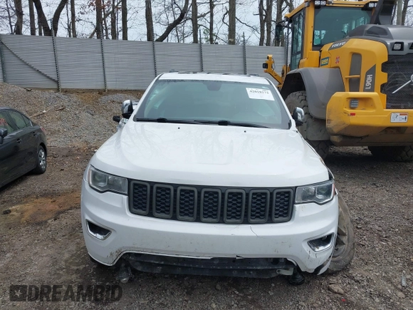 2018 Jeep Grand Cherokee Limited with VIN 1C4RJFBG0JC144620, listed as a IAAI auction lot 42018572 with 124,874 mi miles and . Bid and sale history available at DreamBid. Image 13.