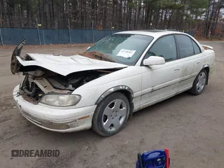2001 Cadillac Catera z VIN W06VR54R31R002275, wystawiony jako IAAI lot #41328461 z przebiegiem 140 400 mil mil oraz . Historia ofert i sprzedaży dostępna na DreamBid. Obrazek 2.