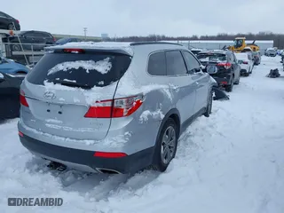 2014 Hyundai Santa Fe Limited with VIN KM8SN4HF9EU063913, listed as a IAAI auction lot 41603328 with 141,580 mi miles. Bid and sale history available at carsss.com. Image 4.