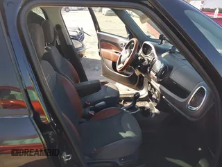 2014 FIAT 500L Trekking with VIN ZFBCFADH1EZ009720, listed as a IAAI auction lot 41497877 with 99,448 mi miles and . Bid and sale history available at DreamBid. Image 5.