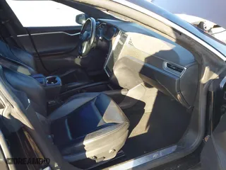 2015 Tesla Model S 85D with VIN 5YJSA1H46FF096603, listed as a IAAI auction lot 41084296 with 114,466 mi miles. Bid and sale history available at carsss.com. Image 5.
