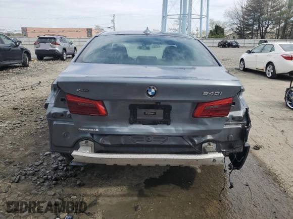 2018 BMW 5 Series 540i xDrive with VIN WBAJE7C54JWC57361, listed as a Copart auction lot 53047545 with 62,312 mi miles and Salvage title. Bid and sale history available at DreamBid. Image 6.