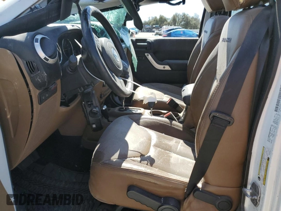 2013 Jeep Wrangler Unlimited Rubicon with VIN 1C4HJWFG4DL549356, listed as a Copart auction lot 46799055 with 172,327 mi miles and Salvage Title. Bid and sale history available at carsss.com. Image 7.