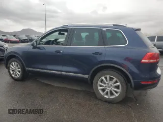 2014 Volkswagen Touareg Sport with VIN WVGEF9BP8ED009107, listed as a Copart auction lot 49070895 with 119,652 mi miles and Clean Title. Bid and sale history available at DreamBid. Image 2.