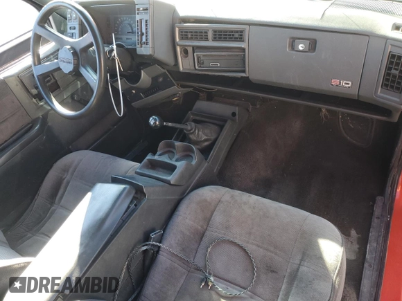 1990 Chevrolet Blazer z VIN 1GNCS18Z2L8113073, wystawiony jako Copart lot #87676865 z przebiegiem 22 827 mil mil oraz Szkoda całkowita • Salvage title. Historia ofert i sprzedaży dostępna na DreamBid. Obrazek 8.