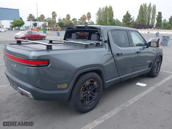 2022 Rivian R1T Adventure Package with VIN 7FCTGAAA3NN010046, listed as a IAAI auction lot 37390674 with 1 mi miles. Bid and sale history available at carsss.com. Image 4.
