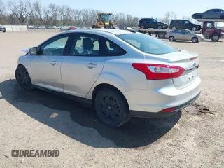 2012 Ford Focus SE with VIN 1FAHP3F2XCL217086, listed as a IAAI auction lot 42072717 with 112,549 mi miles. Bid and sale history available at carsss.com. Image 3.