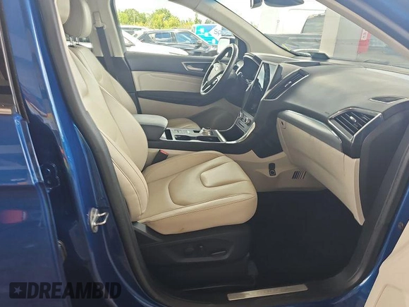 2021 Ford Edge Titanium with VIN 2FMPK3K98MBA53776, listed as a IAAI auction lot 42785493 with 114,856 mi miles and . Bid and sale history available at DreamBid. Image 3.