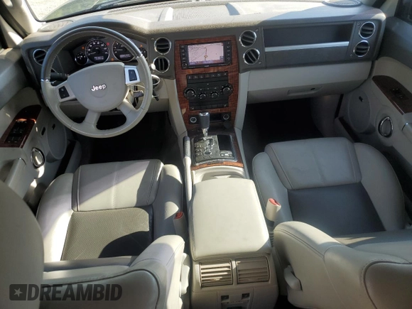 2010 Jeep Commander Limited with VIN 1J4RG5GT1AC129682, listed as a Copart auction lot 55215375 with 36,906 mi miles and Salvage title. Bid and sale history available at DreamBid. Image 8.