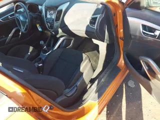 2013 Hyundai Veloster w/Gray Int with VIN KMHTC6AD3DU126193, listed as a IAAI auction lot 41251982 with 119,066 mi miles. Bid and sale history available at carsss.com. Image 5.