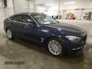 2015 BMW 3 Series 328i Gran Turismo xDrive with VIN WBA3X5C53FD561918, listed as a Copart auction lot 56798165 with 102,423 mi miles and Salvage title. Bid and sale history available at DreamBid. Image 4.