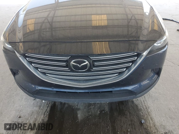 2021 Mazda CX-9 Touring with VIN JM3TCACY7M0528188, listed as a Copart auction lot 53880865 with 63,581 mi miles and Salvage title. Bid and sale history available at DreamBid. Image 12.