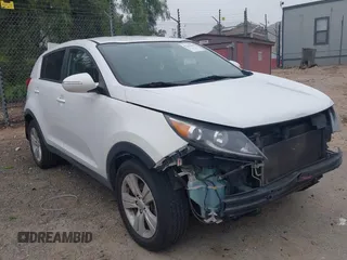 2013 Kia Sportage LX z VIN KNDPB3A23D7514559, wystawiony jako IAAI lot #42141405 z przebiegiem 166 853 mil mil oraz . Historia ofert i sprzedaży dostępna na DreamBid. Obrazek 1.