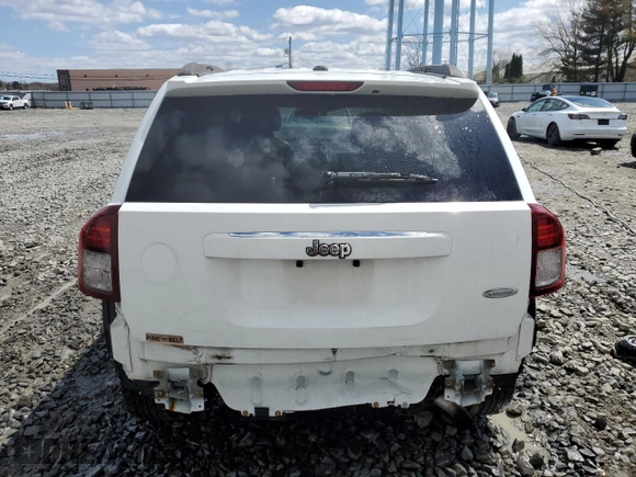 2016 Jeep Compass High Altitude Edition with VIN 1C4NJCEA7GD789837, listed as a Copart auction lot 52000505 with 96,396 mi miles and Salvage Title. Bid and sale history available at carsss.com. Image 6.