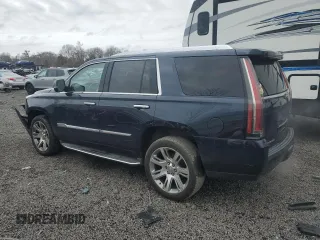2017 Cadillac Escalade Luxury with VIN 1GYS4BKJ2HR236875, listed as a Copart auction lot 52328095 with 103,335 mi miles and Salvage title. Bid and sale history available at DreamBid. Image 2.