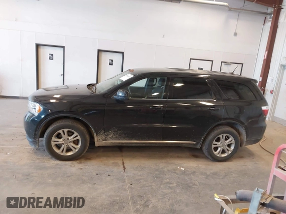 2013 Dodge Durango SXT with VIN 1C4RDJAG1DC681416, listed as a IAAI auction lot 42390313 with 222,022 mi miles and . Bid and sale history available at DreamBid. Image 14.