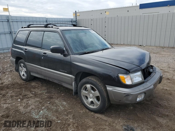 1999 Subaru Forester S with VIN JF1SF6550XH735142, listed as a Copart auction lot 85818264 with 0 mi miles and Salvage Title. Bid and sale history available at carsss.com. Image 4.