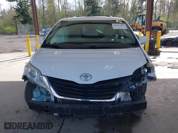 2014 Toyota Sienna LE AAS with VIN 5TDKK3DC4ES505293, listed as a IAAI auction lot 42021409 with 70,319 mi miles. Bid and sale history available at carsss.com. Image 12.