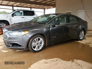 2018 Ford Fusion Hybrid S with VIN 3FA6P0UU6JR142119, listed as a Copart auction lot 73036474 with 135,839 mi miles and Salvage Title. Bid and sale history available at carsss.com. Image 1.