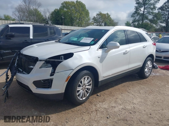 2017 Cadillac XT5 FWD with VIN 1GYKNARS0HZ107734, listed as a IAAI auction lot 41882031 with 89,397 mi miles. Bid and sale history available at carsss.com. Image 18.