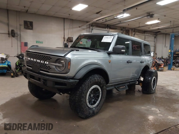2023 Ford Bronco z VIN 1FMEE5DP2PLB55066, wystawiony jako IAAI lot #41981227 z przebiegiem 16 137 mil mil oraz . Historia ofert i sprzedaży dostępna na DreamBid. Obrazek 2.