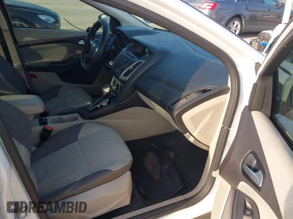 2014 Ford Focus SE with VIN 1FADP3F26EL163285, listed as a IAAI auction lot 42174124 with 172,016 mi miles and . Bid and sale history available at carsss.com. Image 5.