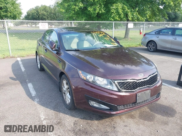 2012 Kia Optima EX with VIN 5XXGN4A65CG006101, listed as a IAAI auction lot 39989235 with 75,995 mi miles and . Bid and sale history available at carsss.com. Image 1.
