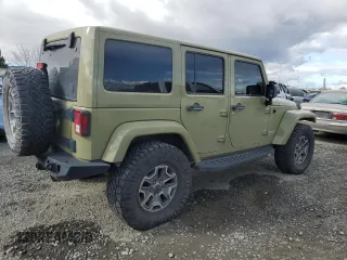 2013 Jeep Wrangler Unlimited Rubicon 10th Anniversary with VIN 1C4HJWFG4DL549065, listed as a Copart auction lot 75899594 with 127,960 mi miles and Salvage title. Bid and sale history available at DreamBid. Image 3.