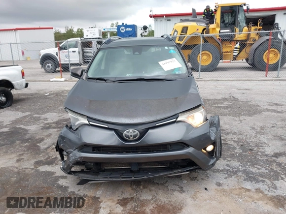 2017 Toyota RAV4 XLE with VIN JTMWFREVXHD096998, listed as a IAAI auction lot 41997925 with 119,564 mi miles and . Bid and sale history available at DreamBid. Image 12.