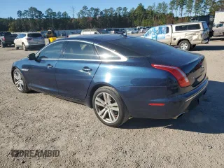 2013 Jaguar XJ with VIN SAJWA2G16DLV50973, listed as a Copart auction lot 82555074 with 148,956 mi miles and Salvage Title. Bid and sale history available at carsss.com. Image 2.